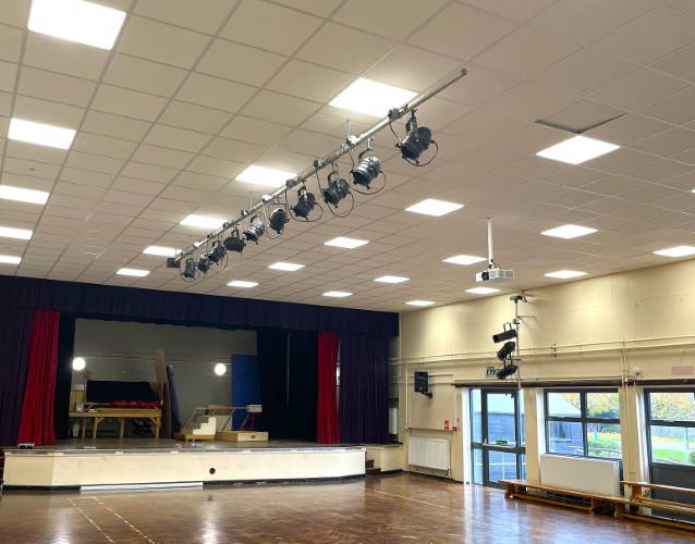 Hounslow School showing results of AJS lighting work in school hall